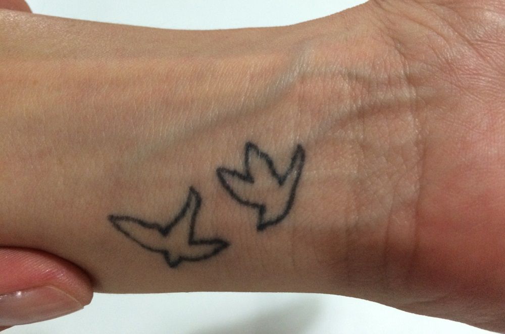 Tatuaje de un pequeño pájaro