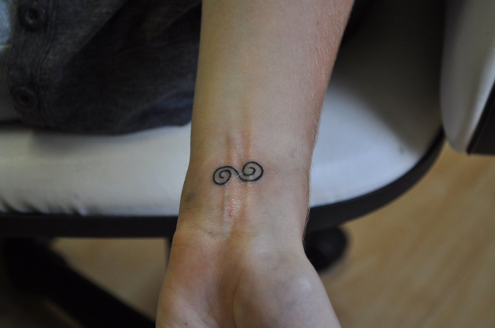 Símbolos sagrados tatuaje